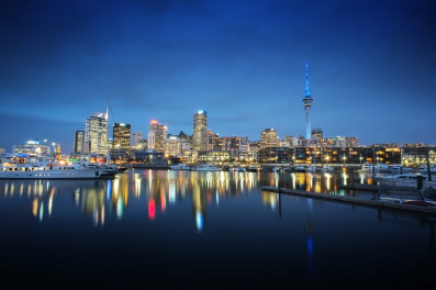 Auckland harbour in night illuminated with lights